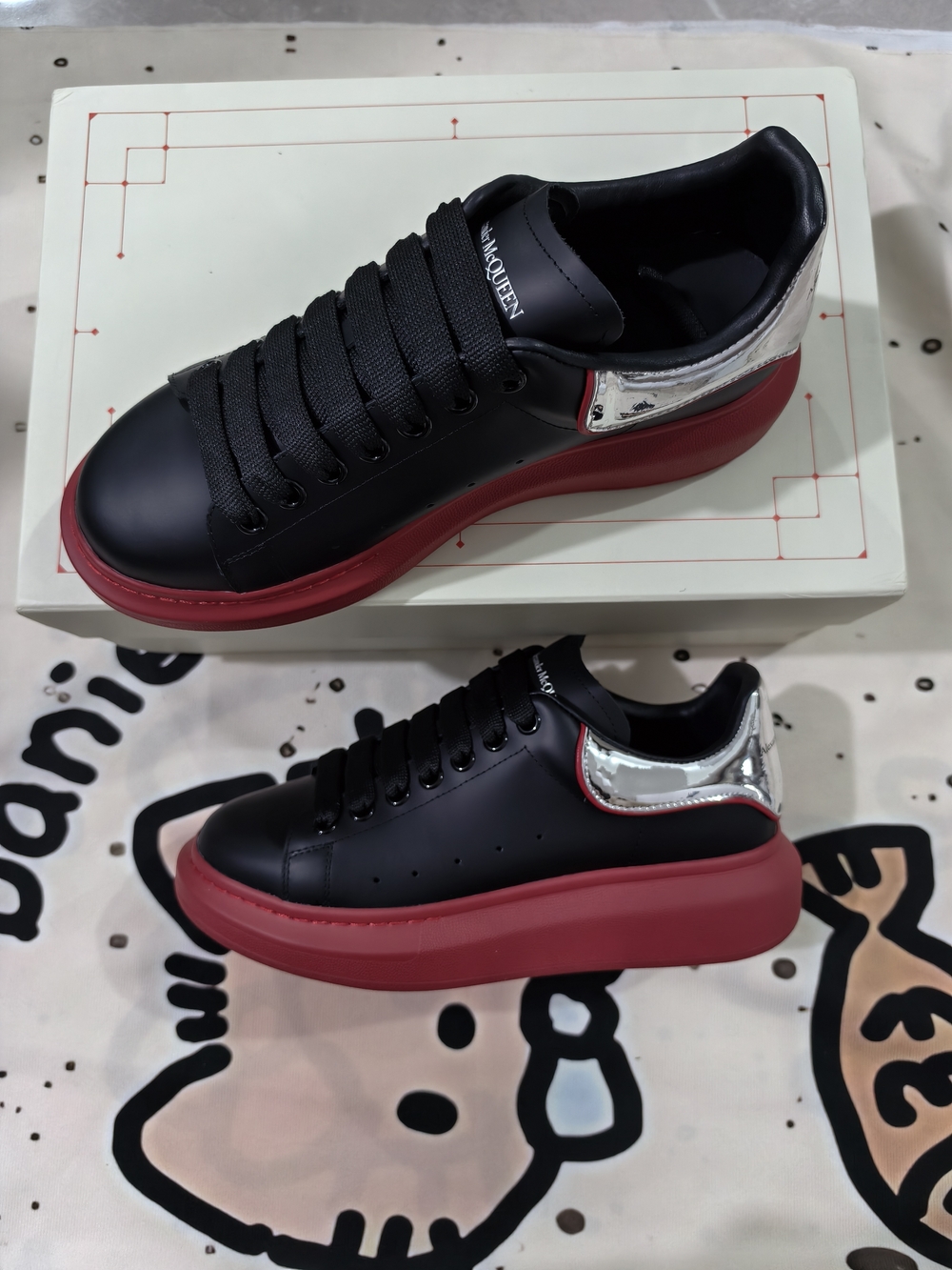 Alexander McQueen Black Leather Sneakers with Red Sole and Silver Heel